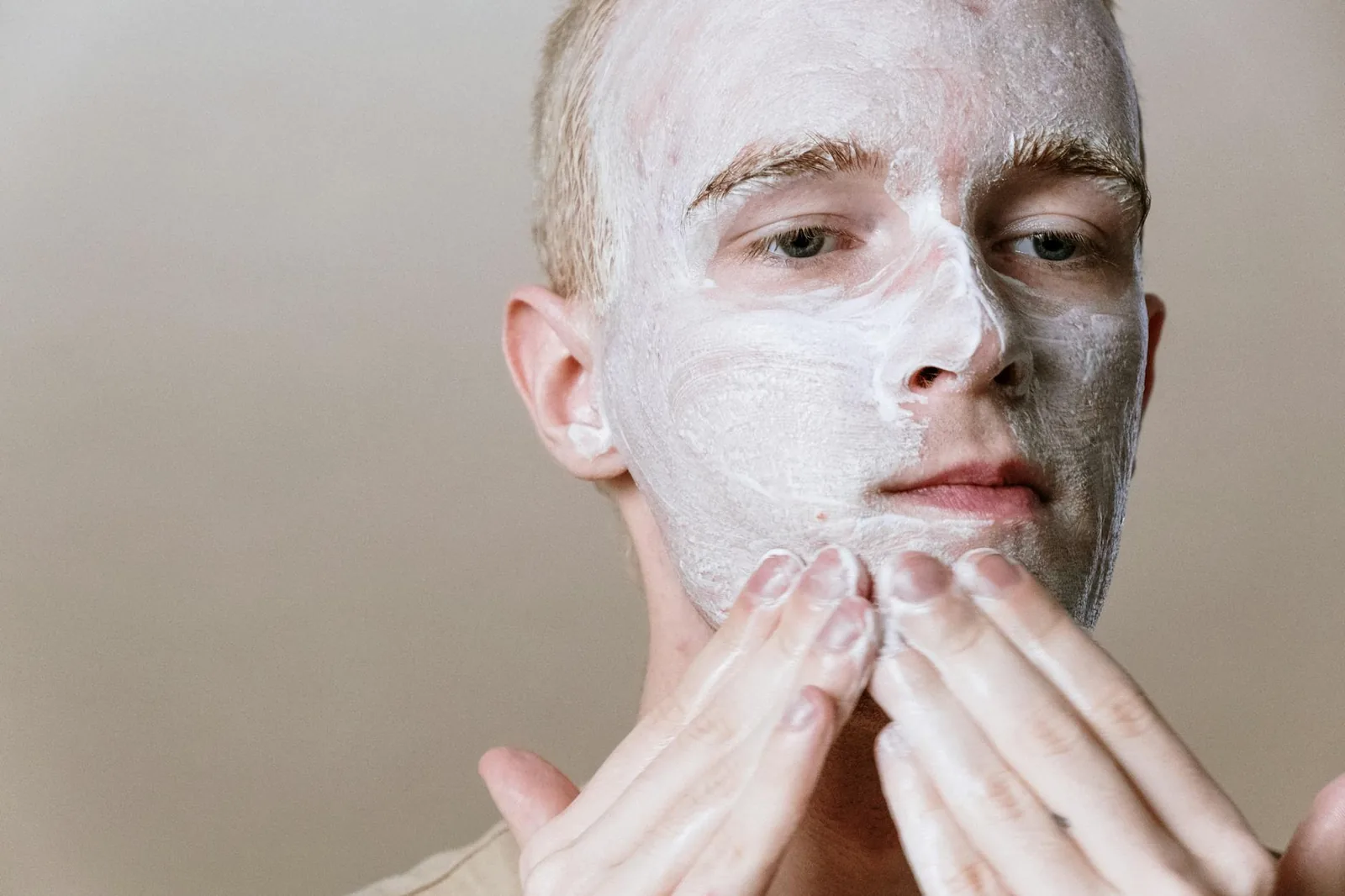 Close-up of gentle facial cleansing as part of a skincare routine.